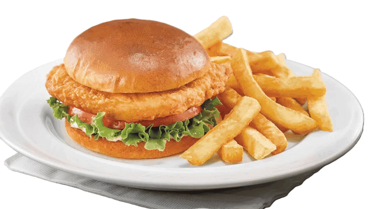 Crispy chicken sandwich with fries at Calgary Pub & Restaurant near Forest Lawn, Calgary, AB