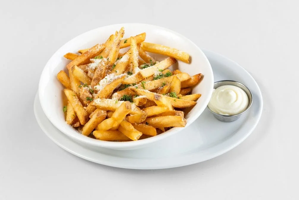 Parmesan fries with garlic aioli at Calgary Pub & Restaurant in SE Calgary, AB