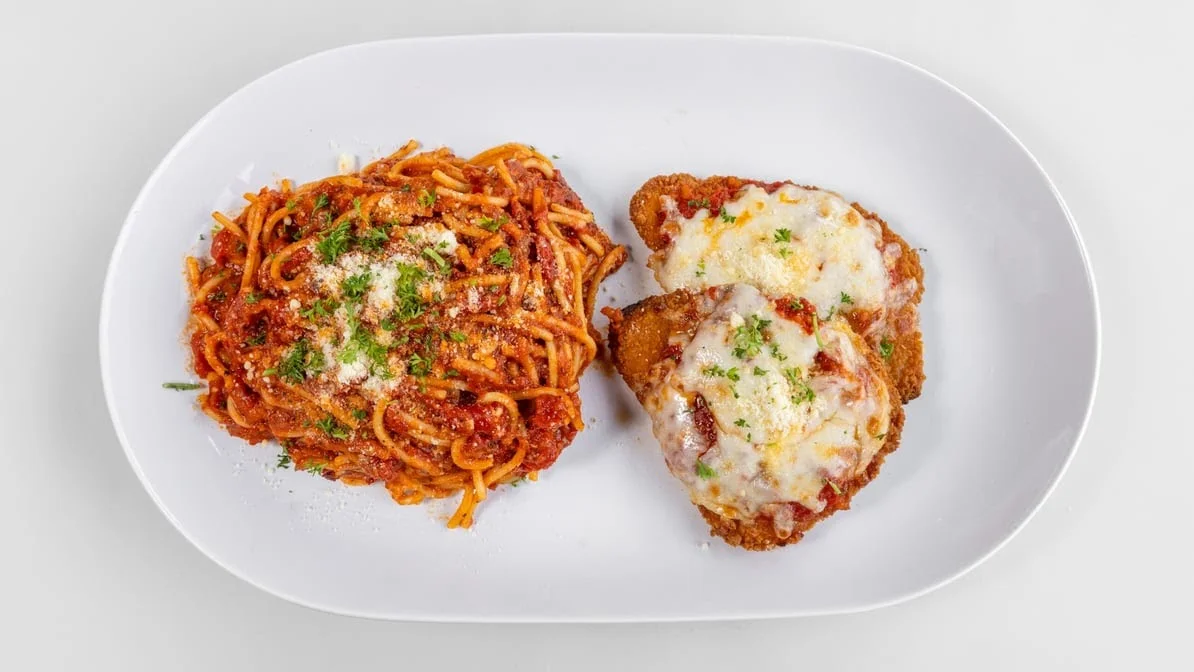 Chicken Parmesan Pasta with marinara at Calgary Pub & Restaurant in SE Calgary, AB