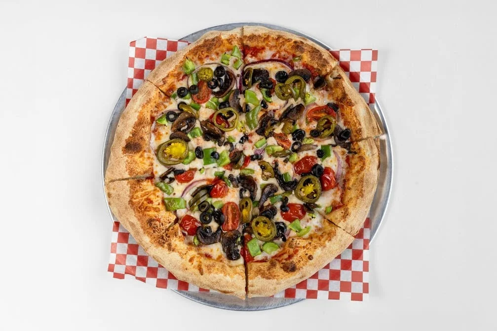 Veggie pizza with olives, jalapeños and peppers at Calgary Pub & Restaurant in SE Calgary, AB